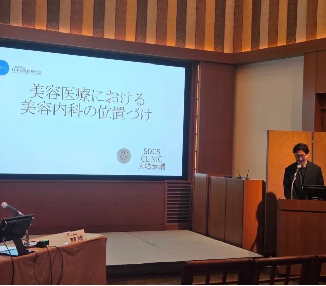 学会で発表する大嶋先生