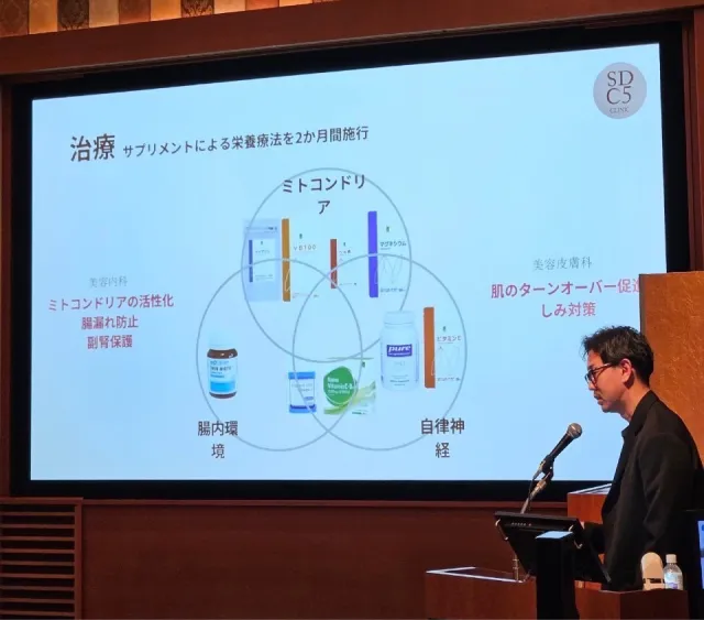 学会で発表する大嶋先生